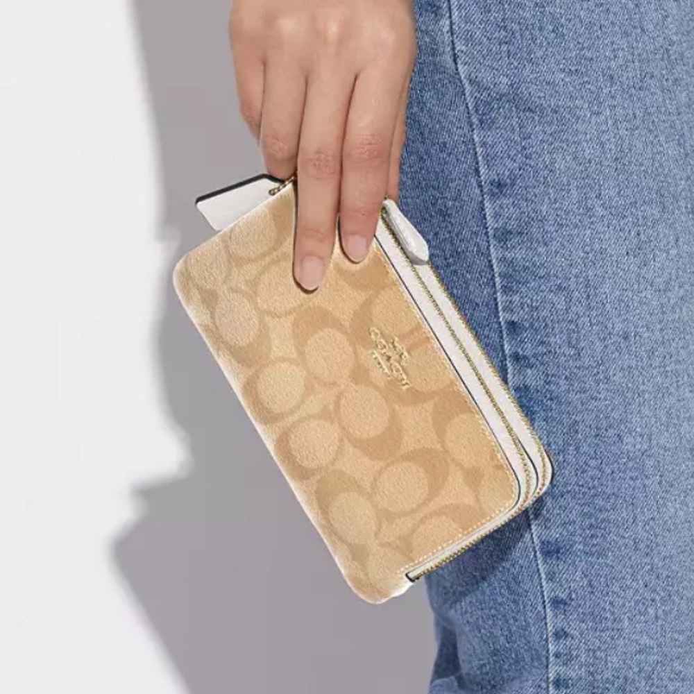 Coach wristlet in tan.
